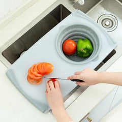 Cutting Board with built in colander